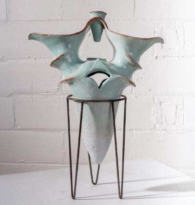 &ldquo;celadon-ish vase in a stand, on a pedestal&rdquo;